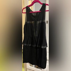 Black express peplum dress. Mesh and leather.